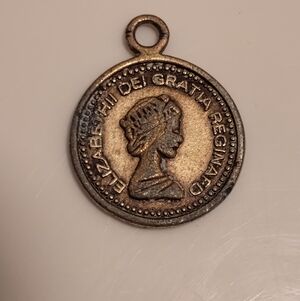 Vintage Queen Elizabeth II coin pendant.